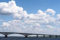 Beautiful white clouds above the bridge through the river Royalty Free Stock Photo