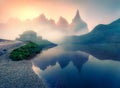 Impressive morning view of Baita Segantini mountain refuge with Cimon della Pala peak. Unbelievable summer sunrise in Dolomiti Royalty Free Stock Photo