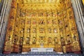 The impressive ornate gold plated altar inside the cathedral of Sevilla Seville Spain