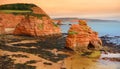 Impressive red sandstones of the Ladram bay on the Jurassic coast, a World Heritage Site on the English Channel coast of southern