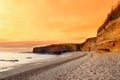 Impressive red sandstones of the Ladram bay on the Jurassic coast, a World Heritage Site on the English Channel coast of southern