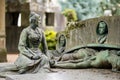 Impressive sculptures on the tombs and monuments of Cimitero Monumentale di Milano or Monumental Cemetery of Milan. Milan, Italy Royalty Free Stock Photo