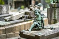 Impressive sculptures on the tombs and monuments of Cimitero Monumentale di Milano or Monumental Cemetery of Milan. Milan, Italy Royalty Free Stock Photo