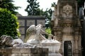 Impressive sculptures on the tombs and monuments of Cimitero Monumentale di Milano or Monumental Cemetery of Milan. Milan, Italy Royalty Free Stock Photo