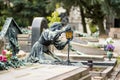 Impressive sculptures on the tombs and monuments of Cimitero Monumentale di Milano or Monumental Cemetery of Milan. Milan, Italy Royalty Free Stock Photo