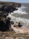 Impressive sea scape of Crimea. Empty rocky beach, waves and cliffs in sunny day Royalty Free Stock Photo