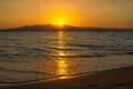 An impressive sunset on the beach in Naxos island. Royalty Free Stock Photo