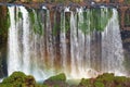 Impressive view of Brazilian side Iguazu falls with fading rainbow in foreground, Foz do Iguacu, Brazil