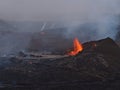 Impressive view of erupting volcano in Geldingadalir valley near Fagradalsfjall mountain, Reykjanes southwest Iceland with smoke. Royalty Free Stock Photo