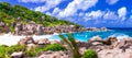 Impressive wild rocky beach Anse Marron in Seychelles. La Digue