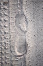 The imprint of the shoe in the sand Royalty Free Stock Photo