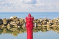 An improbable hydrant at the seaside - Plenty of water concept image Royalty Free Stock Photo