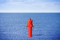 An improbable hydrant at the seaside. Plenty of water concept Royalty Free Stock Photo