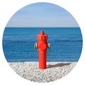 An improbable hydrant at the seaside - Plenty of water concept image - Round icon concept image - Photography in a circle