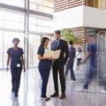 Impromptu meeting in the lobby of a hospital, square format Royalty Free Stock Photo