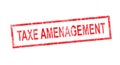 Improvement tax in French translation in red rectangular stamp Royalty Free Stock Photo