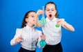 Improving modern medicine. little smart girls with testing flask. back to school. children at chemistry lab. biology