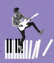 Contemporary art collage of young man palying hand-drawn guitar standing on piano keys isolated over purple background