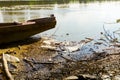 Makeshift pier on polluted river coast Royalty Free Stock Photo