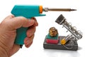 Impulse soldering iron in hand Royalty Free Stock Photo