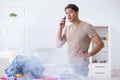 The inattentive husband burning clothing while ironing Royalty Free Stock Photo