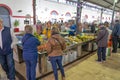 interior of the municipal market of LoulÃ© in the Algarve region during the afternoon with customers and vendors.