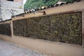 Inca bas-reliefs on the wall in Aguas Calientes, Peru Royalty Free Stock Photo