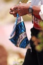 Inca men knitting a hat in Taquile, Island Puno, Peru