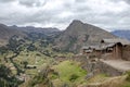 Inca ruins in Pisac archeological site and green peruvian Andes mountains, Sacred valley of the Incas, Peru Royalty Free Stock Photo