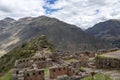 Inca ruins in Pisac archeological site surrounded by green peruvian Andes mountains, Sacred valley of the Incas, Peru Royalty Free Stock Photo