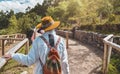 Tourist exploring at Archaelogical Qenqo. Strange and weird rock structures. Neighborhoods Cusco City. Royalty Free Stock Photo