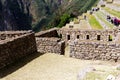 Inca Stone Wall Ruins And Tourist Machu Picchu Peru