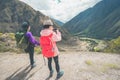 Inca Trail, Peru: August 11th, 2018:Two young female hikers are taking photos on the famous Inca Trail. They will need to walk 4