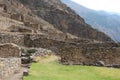 Incan farming terraces, storage buildings and garrisons built into the mountainside at Ollantaytambo in Peru, South America Royalty Free Stock Photo