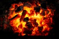 Incandescent charcoal embers with pretty orange tones Royalty Free Stock Photo