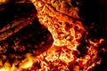 Incandescent details of orange and red charcoal embers for barbecue at the picnic. Texture Royalty Free Stock Photo