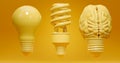 Incandescent, energy saving and human brain light bulbs over yellow background. Concept of evolution, inspiritation Royalty Free Stock Photo