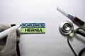 Incarcerated hernia text on top view  on white background. Healthcare/medical concept Royalty Free Stock Photo