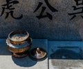 Incense bowl on concrete slab