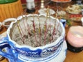 Incense burner, Blue Ceramic incensory with smoke in a pagoda, selective focus