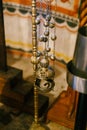 Incense burner hanging on a metal stand in a church Royalty Free Stock Photo