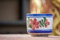 Incense burner on table rock Royalty Free Stock Photo