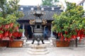 Incense burner and trees with prayer ribbons Royalty Free Stock Photo