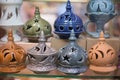 Incense burners lined up for sale in a row Royalty Free Stock Photo