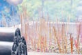 Incense burning on joss sticks at a Chinese Buddhist temple Royalty Free Stock Photo