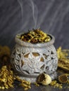 Incense with herbs and tree resins