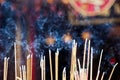 Incense left burning by worshipers at Wong Tai Sin Temple