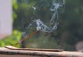 Incense stick and smoke from incense burning. Beautiful smoke. B Royalty Free Stock Photo