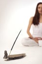 Incense stick with woman in lotus posture