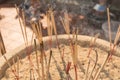 Incense sticks burning with white smoke on incense pot Royalty Free Stock Photo